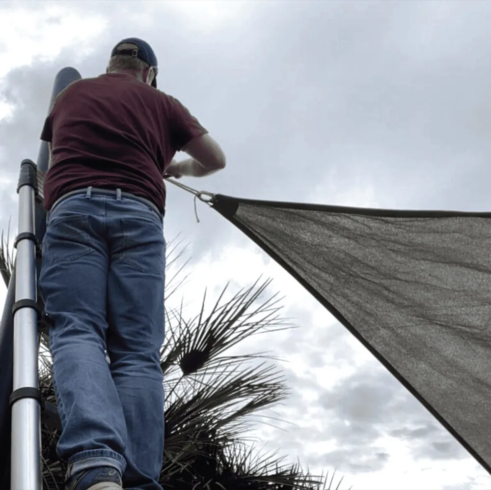 shadedesign® installer tensioning a shade sail